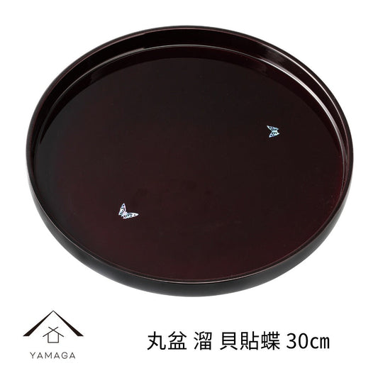 带贝壳和蝴蝶设计的圆形托盘